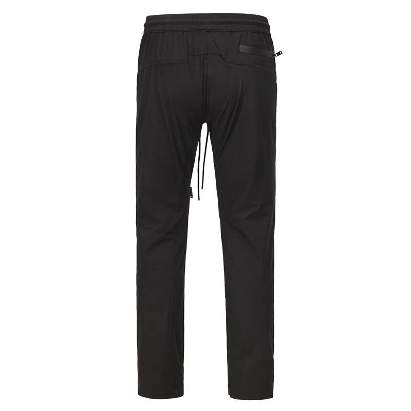 Curved Zip Nylon Flare Tech Cargo Trousers